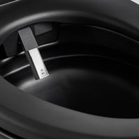 Self-cleaning bidet nozzle extended from Milano matte black smart toilet