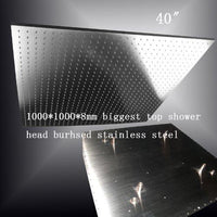 Large square ceiling mounted rainfall shower head overhead view