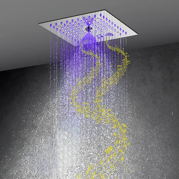 Blue and purple LED rainfall — hand holding remote while Cascada Royale shower runs overhead
