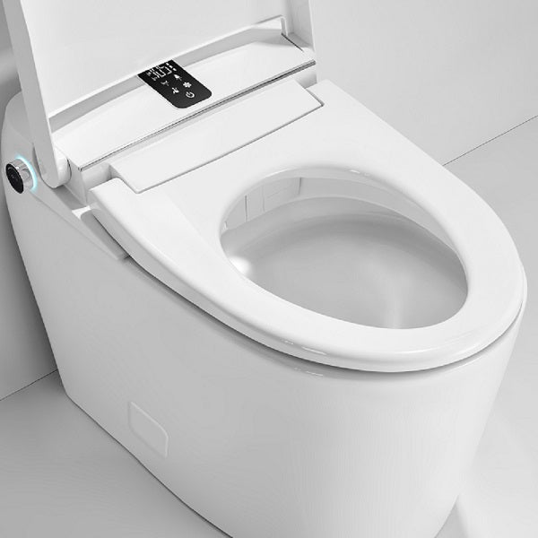 White one-piece smart toilet rear view with power connection 