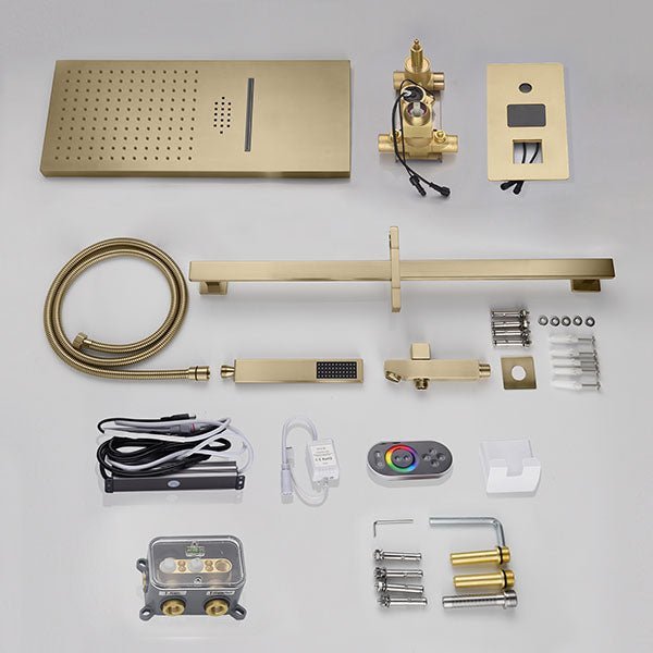 Collection of gold bathroom fixtures and components on a white background