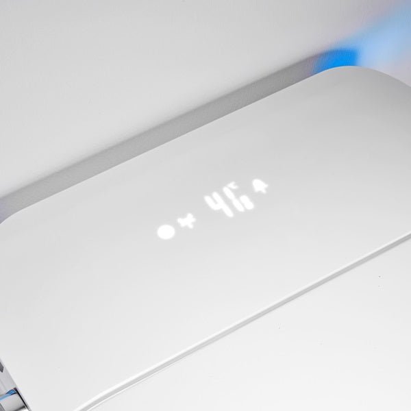 Digital display on Annecy smart toilet showing temperature and ambient lighting controls