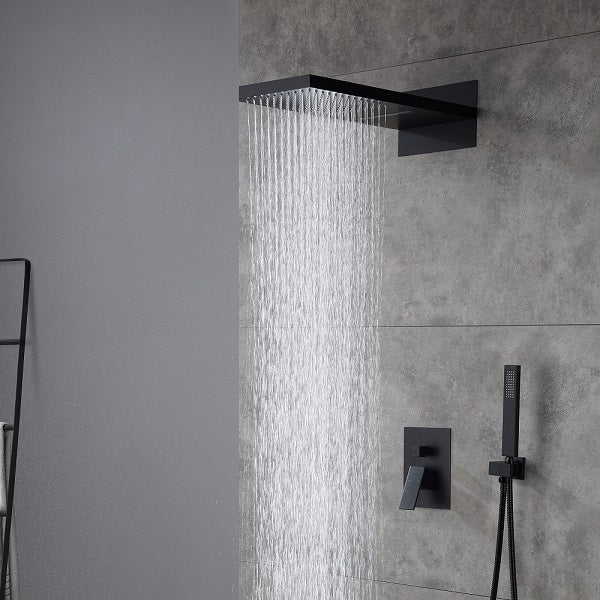 Cascada Amadora Black rain shower head and handheld shower on a gray tiled wall