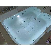 Whirlpool bathtub with LED lights in a bathroom setting