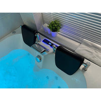 Polished chrome waterfall faucet set included with Cascada Amalfi bathtub