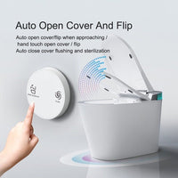 Smart toilet with auto open cover and flip feature on a gray background