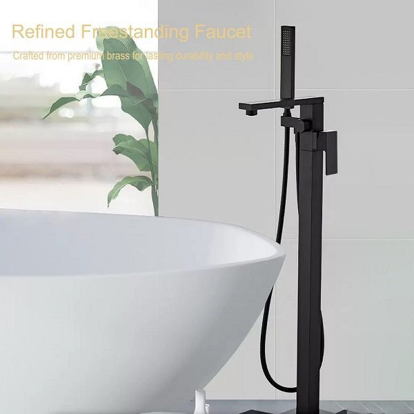 Black freestanding faucet next to a white bathtub with a plant in the background