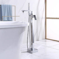 Chrome freestanding bathtub faucet with handheld shower head in a bathroom setting.