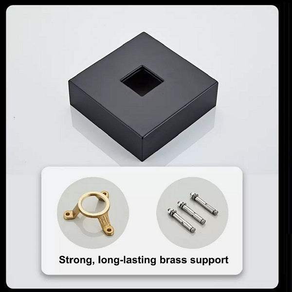 Black square support with brass and metal components on a white background