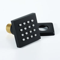 Black square shower head with gold nozzle 
