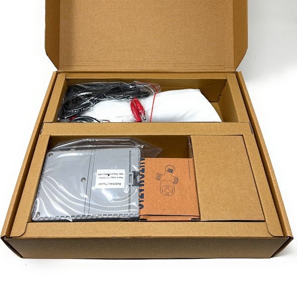 Open cardboard box containing electronic components 