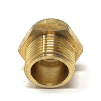 Brass hex nut on a white background
