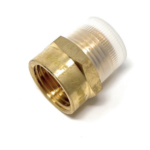 Brass plumbing fitting on a white background