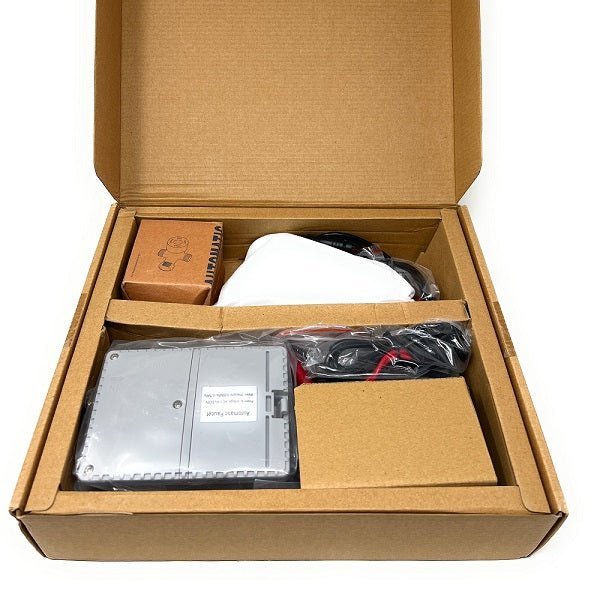 Open cardboard box containing electronic components 